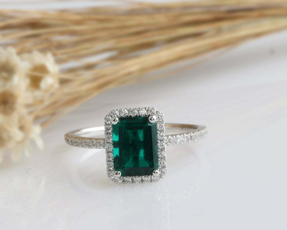 1.5ct Green Emerald Cut Halo Solitaire with Accents Ring 14k White Gold Finish