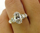 5Ct Oval Cut Diamond Solitaire Ring 14K Yellow Gold Finish Heart Shape Accents