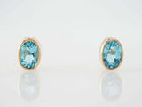 3.2ct Oval Cut Blue Topaz Bezel Set Solitaire Stud Earrings 14k Yellow Gold Over