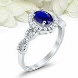 2ct Oval Cut Blue Sapphire Engagement Ring Twist Shank Halo 14k WhiteGold Finish