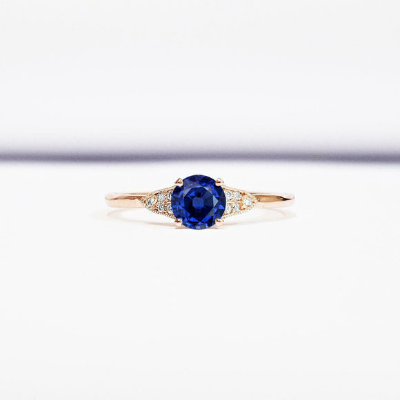 0.5ct Round Cut Blue Sapphire Solitaire with Accents Ring 14k Rose Gold Finish