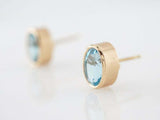 3.2ct Oval Cut Blue Topaz Bezel Set Solitaire Stud Earrings 14k Yellow Gold Over