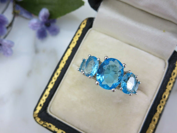 2.5ct Oval Cut Blue Topaz Engagement Ring Five Stone 14k White Gold Finish