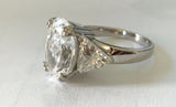 2.5Ct Oval Cut Diamond Three Stone Ring 14K White Gold Finish Trillion Accents