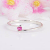 0.2ct Round Cut Pink Sapphire Tension Set Solitaire Ring 14k White Gold Finish