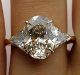 4Ct Oval Cut Diamond Trilogy Solitaire Ring 14K Yellow Gold Over Trillion Accent