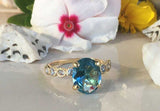 2.1ct Engagement Ring Oval Blue Topaz Round Diamond Accent 14k Yellow Gold Over