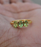 2.25ct Oval Cut Green Peridot Trilogy Engagement Ring 14k Yellow Gold Finish