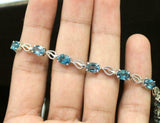 5ct Oval Cut London Blue Topaz Leaf Design Bracelet 14K White Gold Finish