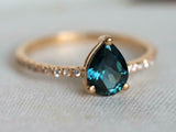 1.2ct Pear Cut London Blue Topaz Solitaire with Accent Ring 14k Rose Gold Finish