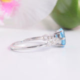 1.6ct Oval Cut Blue Topaz Engagement Ring Diamond Accents 14k White Gold Finish