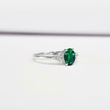 0.5ct Oval Green Emerald Round Diamond Accent Engagement Ring 14k WhiteGold Over