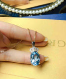 2.1ct Blue Topaz Pendant with Chain Oval Cut Diamond Crown 14k White Gold Finish