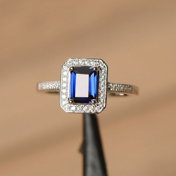 1.3ct Emerald Cut Blue Sapphire Solitaire Engagement Ring 18k White Gold Finish