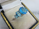 2.5ct Oval Cut Blue Topaz Engagement Ring Five Stone 14k White Gold Finish