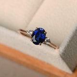 1ct Oval Blue Sapphire Engagement Ring Round Accents Trilogy 14k Rose Gold Over