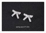 3Ct Baguette Cut Diamond Knot Design Stud Earrings Women 14K White Gold Finish