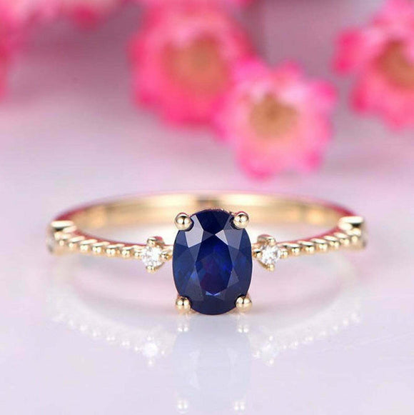 1ct Oval Cut Blue Sapphire Engagement Ring Diamond Trilogy 14k YellowGold Finish