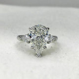 3Ct Pear Cut Diamond Three Stone Solitaire Engagement Ring 18K White Gold Finish