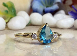 1.4ct Engagement Ring Pear Cut Blue Topaz Trilogy Minimalist 14k YellowGold Over