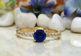 1.2ct Round Cut Blue Sapphire Solitaire with Accent Ring 14k Yellow Gold Finish