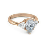 3Ct Pear Cut Diamond Trilogy Engagement Ring 14K Rose Gold Over Trillion Accents