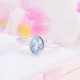 1ct Oval Cut Blue Topaz Engagement Ring Bezel Set Solitaire 14k White Gold Over