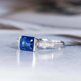 1.5ct Emerald Cut Blue Sapphire Accent with Solitaire Ring 14k White Gold Finish