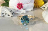 2.1ct Engagement Ring Oval Blue Topaz Round Diamond Accent 14k Yellow Gold Over