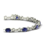 10ct Oval Cut Blue Sapphire Infinity Knot Tennis Bracelet 14k White Gold Over