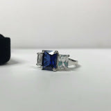 2.5ct Emerald Cut Blue Sapphire Trilogy Engagement Ring 14k White Gold Finish